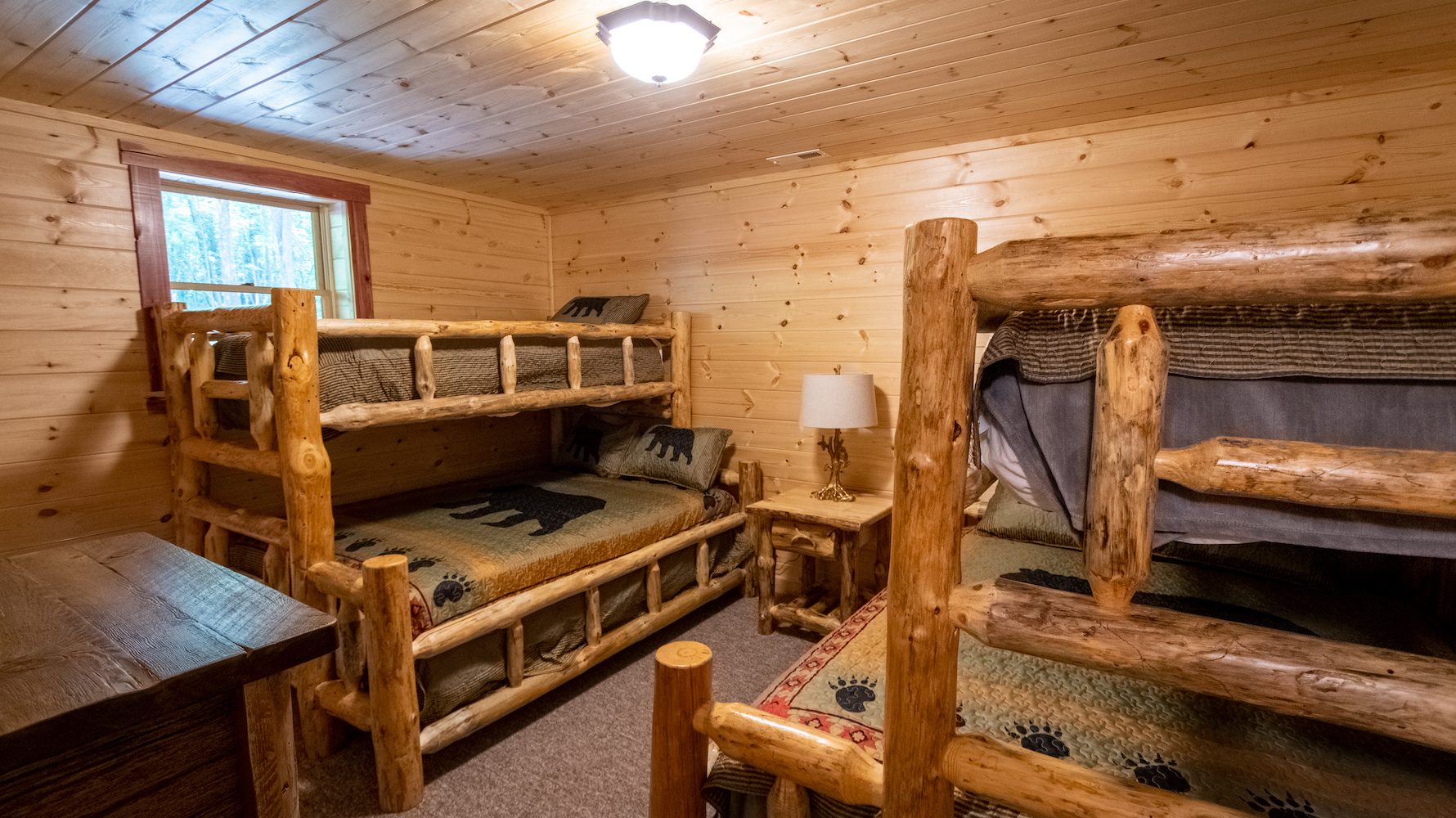 Photo 2006_8146.jpg - Lower level bunk room. Twin XLs over queen beds. Sleeps 6.