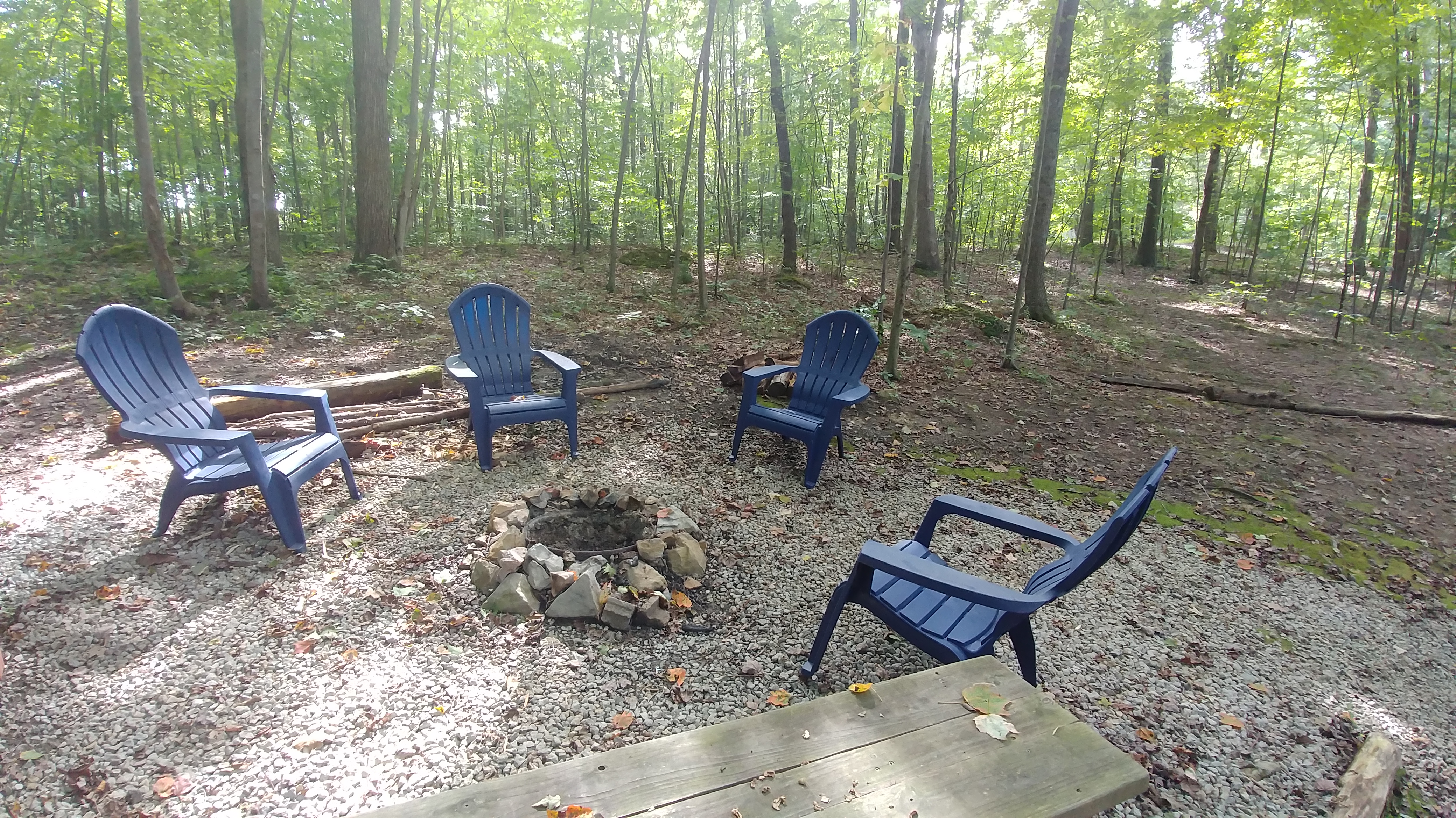 Photo 619_7571.jpg - The fire pit is located in our wooded surrounding, such a peaceful setting!