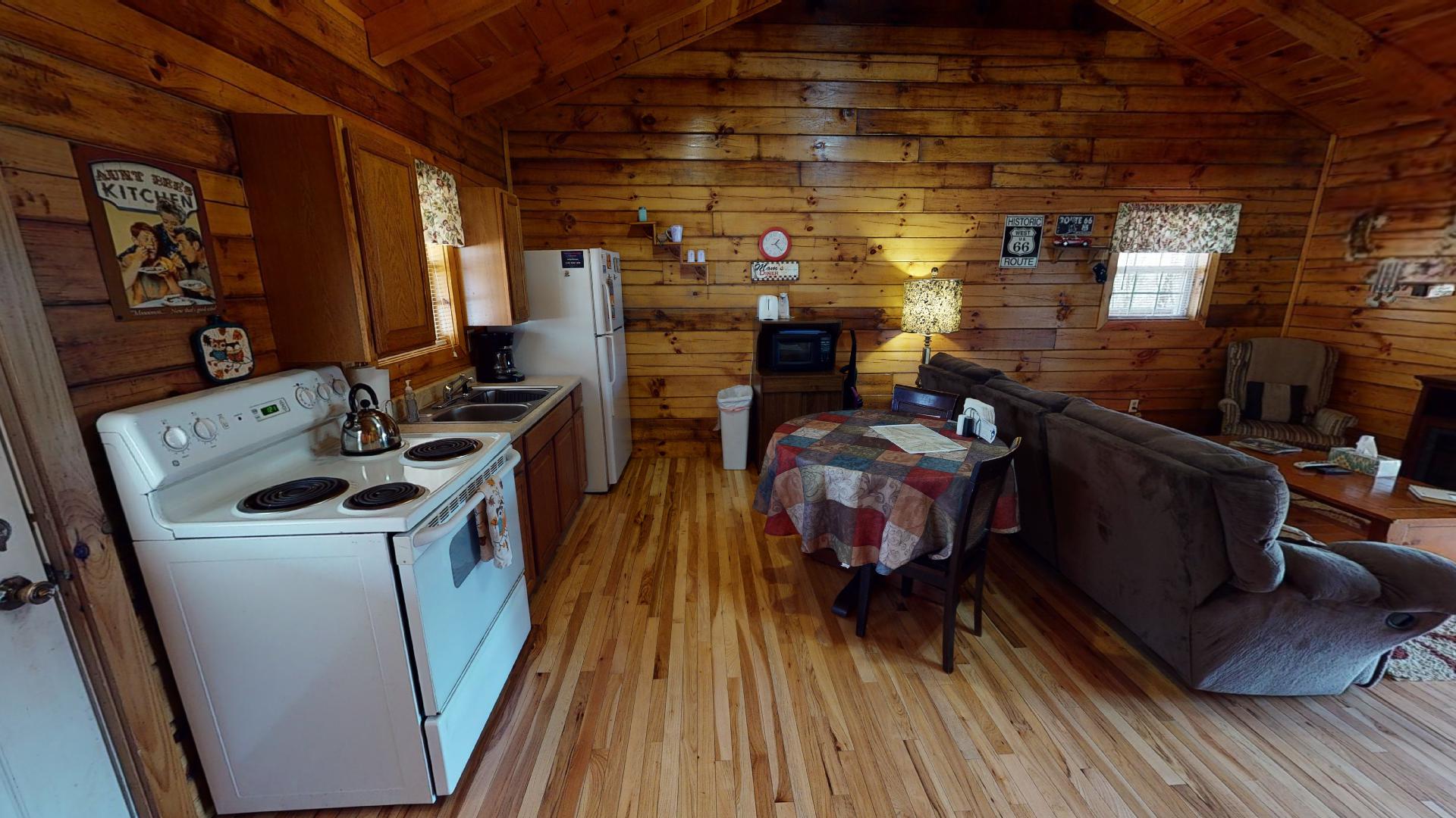 Photo 663_9164.jpg - Quaint and cozy kitchen with eat in area.